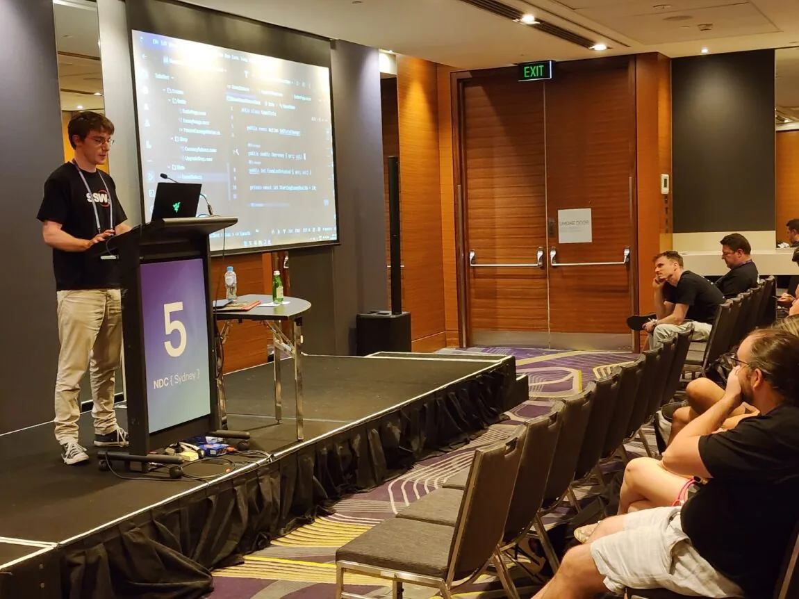 Luke Parker presenting to an audience