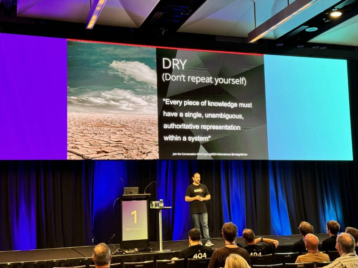 Matt Goldman presenting on stage