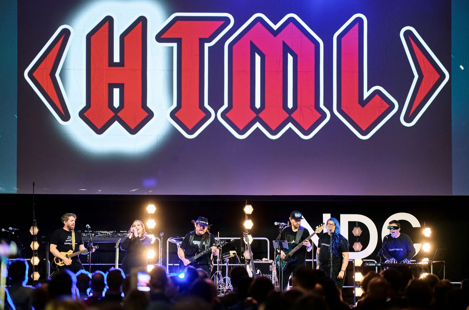 Dev band HTML performing on the NDC stage