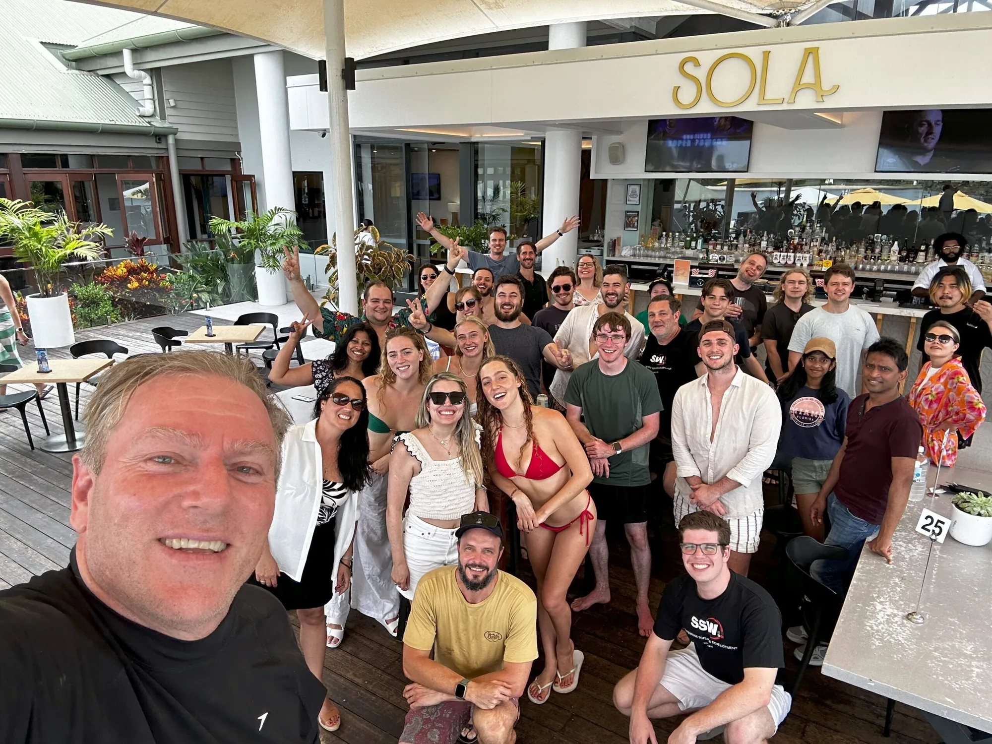 Group of people in front of a restaurant