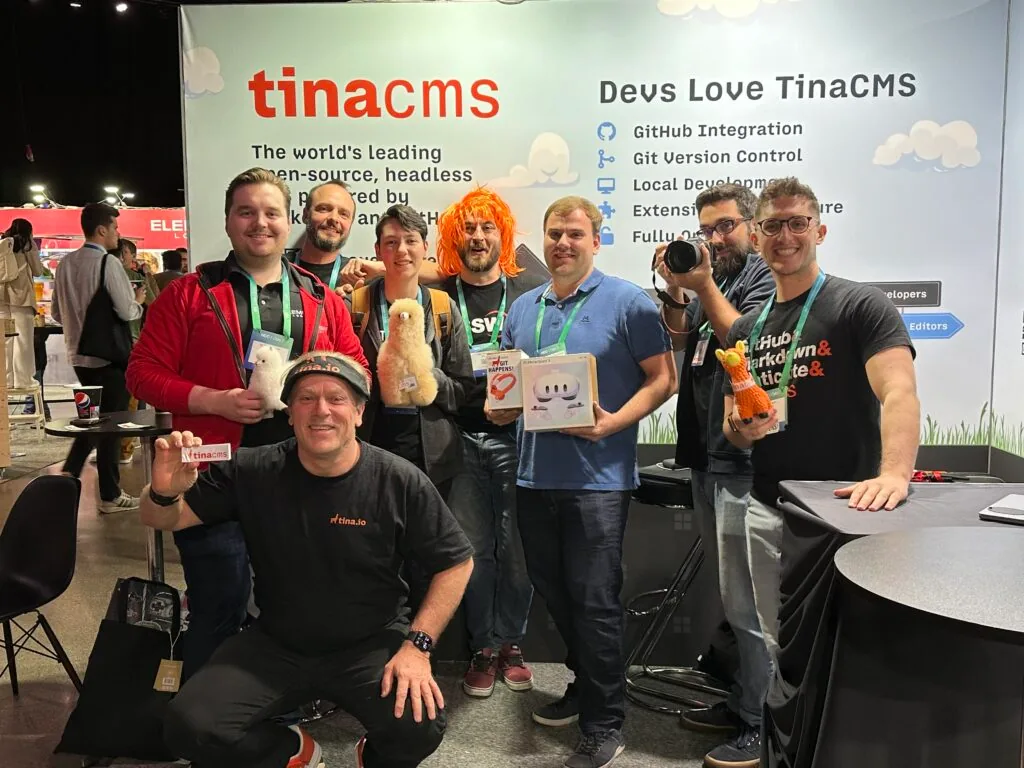 Group of people with llama toys and other tech