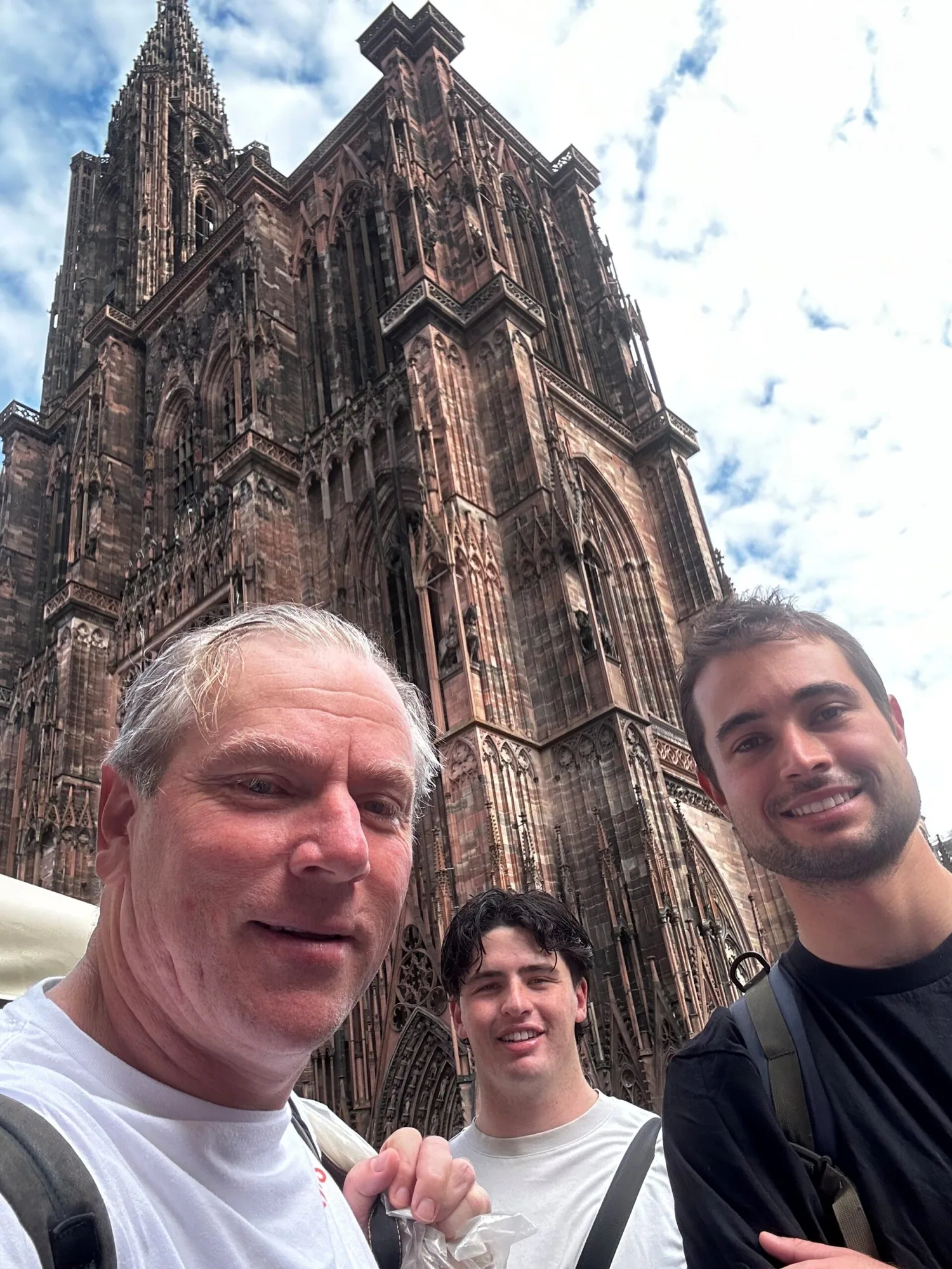 Cathedral and people smiling